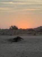 sun setting at st lucia kzn south africa.jpeg